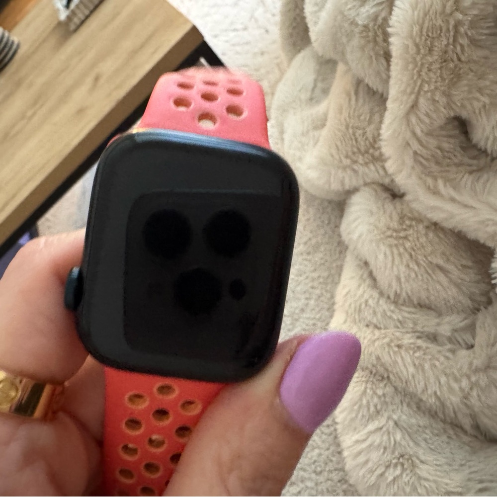 Apple Watch Series 7 with Pink and Black Band